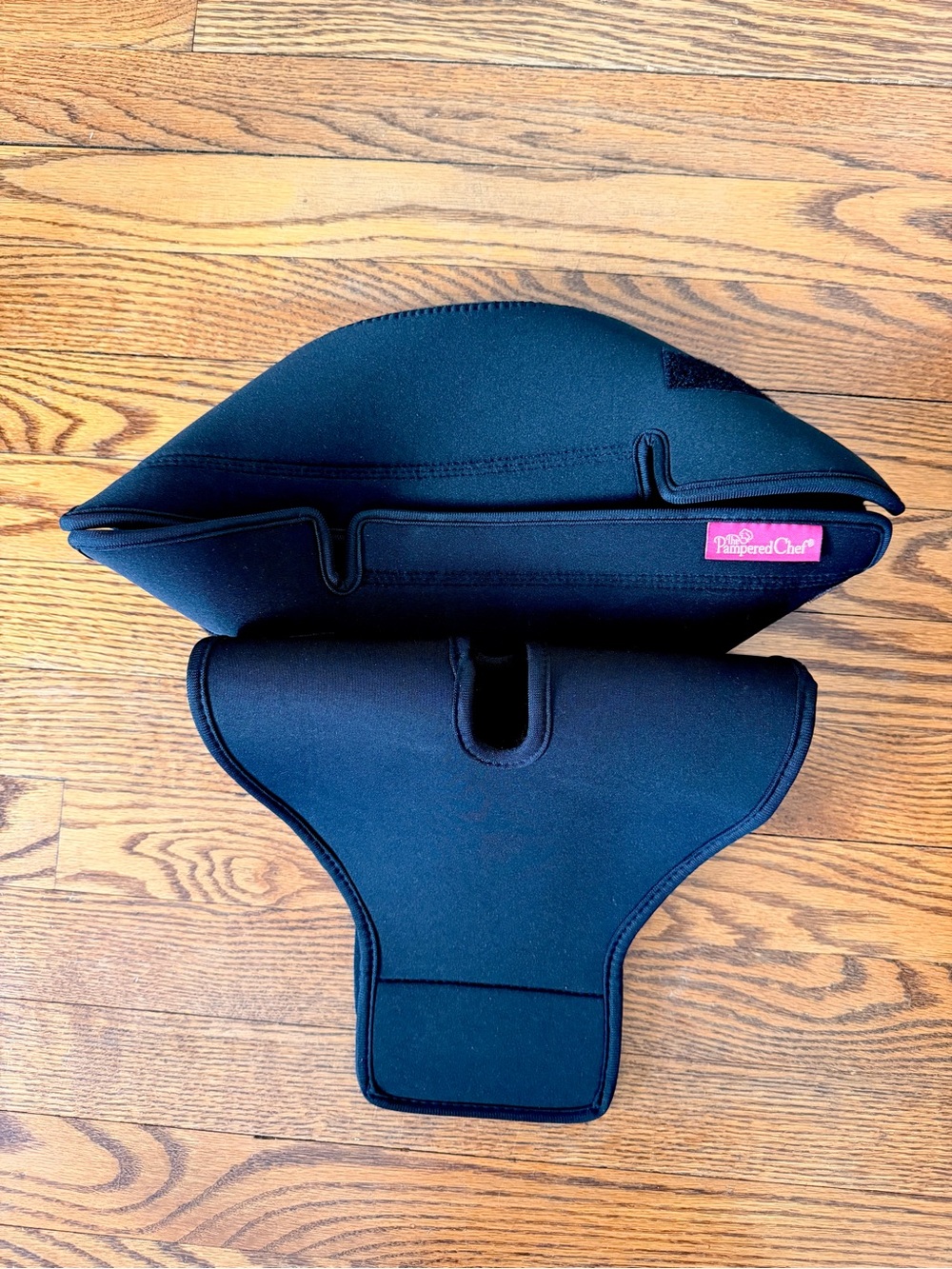 Pampered Chef Black Neoprene Sleeve with Pink Logo Tag